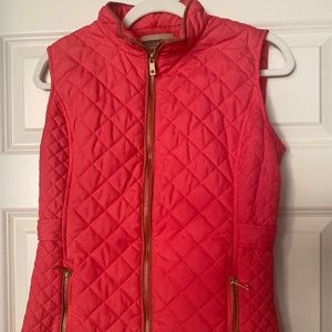 Pink quilted vest with gold accents